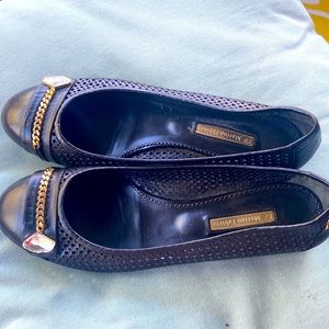 Marino Fabiani, black flats